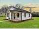 Attractive single-story home featuring a welcoming front porch, black framed windows, and a well-maintained yard at 141 Ark St, Kings Mountain, NC 28086