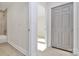Bright hallway with light flooring and closet/bathroom access at 141 Ark St, Kings Mountain, NC 28086