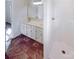 Bathroom featuring double sink vanity, shower stall, and modern fixtures at 14106 Carriage Lake Dr, Charlotte, NC 28273
