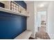 Well-organized entryway with hooks, shelving, and a comfortable bench at 1426 Whitman Ct, York, SC 29745
