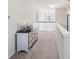 Upper hallway features neutral walls, carpet, and decorative lighting fixtures at 1426 Whitman Ct, York, SC 29745