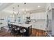 Bright kitchen featuring a center island with bar stools, stainless steel appliances, and ample cabinet space at 1426 Whitman Ct, York, SC 29745