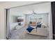 Bright living room with large sectional, window, TV, and ceiling fan at 1426 Whitman Ct, York, SC 29745