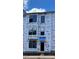 Exterior view of new construction home featuring large windows and a modern design at 15332 Ballancroft Pkwy # 17, Charlotte, NC 28277