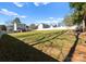 Large, well-maintained backyard with lush grass and a white fence, perfect for outdoor activities at 159 Creekwood Dr, Mooresville, NC 28117