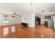 Spacious living room features hardwood floors and lots of natural light from the front picture window at 159 Creekwood Dr, Mooresville, NC 28117