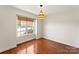 This room is bright and airy and features a large window that lets in plenty of natural light at 159 Creekwood Dr, Mooresville, NC 28117