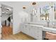 Bathroom featuring stylish vanity, modern lighting, and elegant fixtures at 16112 Terry Ln, Huntersville, NC 28078
