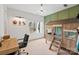 Charming bedroom with a fun, wooden bunk bed and dedicated desk and workspace at 16112 Terry Ln, Huntersville, NC 28078