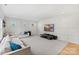 Spacious living room with white walls, comfortable seating, and a large television for entertainment at 16112 Terry Ln, Huntersville, NC 28078