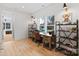 Bright office with a rustic desk, shelving units, and windows with natural light at 16112 Terry Ln, Huntersville, NC 28078