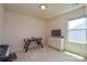 Spare bedroom featuring neutral carpet and walls, and a window with blinds at 173 Glastonbury Dr, Mooresville, NC 28115