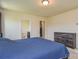 A cozy bedroom setup includes a dresser, closet, and bathroom access, all designed for comfort and functionality at 173 Glastonbury Dr, Mooresville, NC 28115