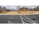 Community clubhouse with pool, sidewalk, and well-maintained landscaping for neighborhood enjoyment at 173 Glastonbury Dr, Mooresville, NC 28115