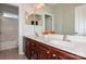 Bathroom features a double sink vanity, modern fixtures, and ample natural light at 1812 Mill Chase Ln, Waxhaw, NC 28173