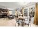 Open-concept living area with a fireplace, dining table, and comfortable seating at 1919 Windlock Dr, Charlotte, NC 28270