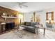 Comfortable living room featuring a brick fireplace and neutral decor at 1919 Windlock Dr, Charlotte, NC 28270