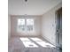 Unfinished bedroom featuring a window and door, ready for personalization at 236 Mark Ryan Ln, Dallas, NC 28034