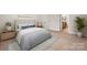Comfortable bedroom with neutral tones, an ensuite bathroom, and great natural light at 2479 Seagull Dr, Denver, NC 28037
