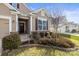 Home exterior with well-maintained landscaping, charming details, and a welcoming entryway at 2479 Seagull Dr, Denver, NC 28037