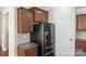 Kitchen area with modern stainless steel refrigerator and ample cabinet space at 2479 Seagull Dr, Denver, NC 28037