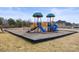 Community playground with slides and play equipment on landscaped grounds at 2479 Seagull Dr, Denver, NC 28037