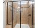 Tile shower with glass enclosure and a built-in bench for a spa-like experience at 2479 Seagull Dr, Denver, NC 28037