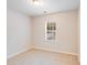 Bedroom with a neutral carpet and a window bringing in natural light at 2679 Southern Trace Dr, Waxhaw, NC 28173