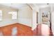 Elegant dining room features hardwood floors, wainscoting and chandelier lighting at 2679 Southern Trace Dr, Waxhaw, NC 28173