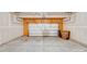 Spacious garage with concrete floor, overhead lighting, and an insulated white door at 2679 Southern Trace Dr, Waxhaw, NC 28173