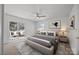 Staged bedroom showcases ample space with a ceiling fan, deck access, and stylish decor at 308 Knox St, Clover, SC 29710