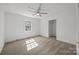 Bedroom with ceiling fan, window, and closet at 308 Knox St, Clover, SC 29710