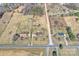 Aerial view features home, neighboring properties, and vast surrounding land at 332 Goforth Rd, Kings Mountain, NC 28086