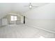 Expansive bonus room featuring carpeted floors, dormered ceilings, ceiling fans and a cozy atmosphere at 332 Goforth Rd, Kings Mountain, NC 28086