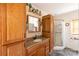 Well-maintained bathroom with wooden vanity, integrated sink, and a walk-in shower at 33320-B Hobe Rd, Albemarle, NC 28001