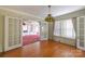 Charming dining room featuring hardwood floors and bright windows at 33320-B Hobe Rd, Albemarle, NC 28001