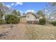 View of the side and back of the house, showcasing the multiple windows at 33320-B Hobe Rd, Albemarle, NC 28001