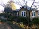 Charming single-story home with a neutral exterior, complemented by tidy landscaping and mature trees at 33320-B Hobe Rd, Albemarle, NC 28001