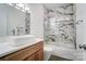 Modern bathroom with a marble-tiled shower, vessel sink, and wood vanity offers a spa-like experience at 3738 Glen Arbor Dr, Maiden, NC 28650