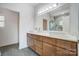 Bathroom featuring a double sink vanity, custom cabinets and a large mirror at 3738 Glen Arbor Dr, Maiden, NC 28650