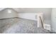 Expansive bonus room with plush gray carpeting offers versatility as a playroom, home office, or entertainment area at 3738 Glen Arbor Dr, Maiden, NC 28650