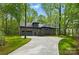 This house has a long driveway and two-car garage at 3738 Glen Arbor Dr, Maiden, NC 28650