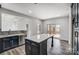 Modern kitchen with a large island, stainless steel appliances and sleek countertops at 3738 Glen Arbor Dr, Maiden, NC 28650