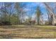 A spacious backyard offers ample space for recreation, gardening, or simply enjoying the outdoors at 3901 Starmount Ave, Charlotte, NC 28269