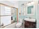 Bathroom featuring a shower, toilet, sink, vanity, and medicine cabinet at 3901 Starmount Ave, Charlotte, NC 28269