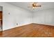 Bright living room boasts gleaming hardwood floors and neutral walls at 4233 Dawnwood Dr, Gastonia, NC 28056