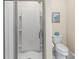 Clean bathroom with a modern shower, toilet, and pristine white walls at 4616 Gold Finch Dr, Denver, NC 28037