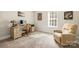 Cozy bedroom with carpet, desk, a cushioned chair and window views at 4616 Gold Finch Dr, Denver, NC 28037