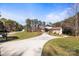 Spacious home with a long driveway surrounded by nature, creating a sense of privacy and tranquility at 4616 Gold Finch Dr, Denver, NC 28037