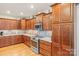 Modern kitchen boasting granite countertops, stylish backsplash, and stainless steel appliances at 4616 Gold Finch Dr, Denver, NC 28037